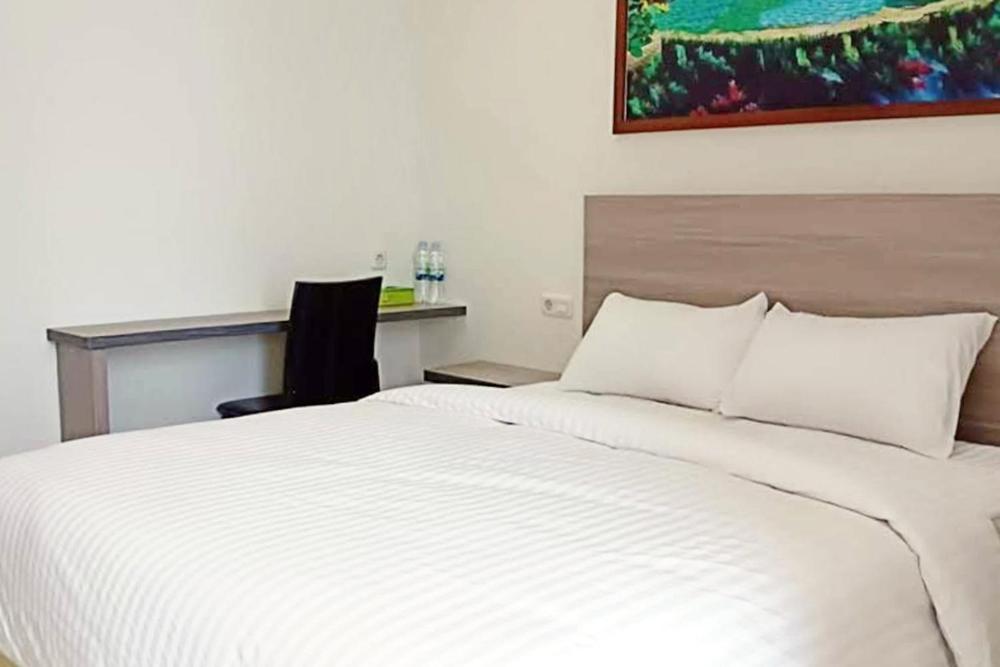 Twospaces Living At Maximus Inn Palembang Exteriör bild