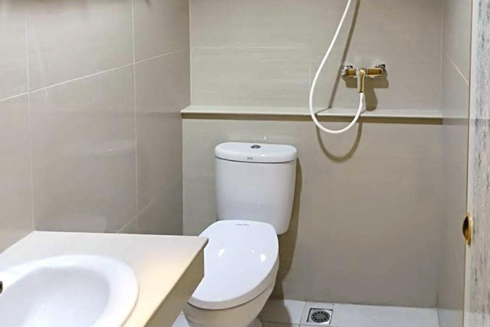 Twospaces Living At Maximus Inn Palembang Exteriör bild