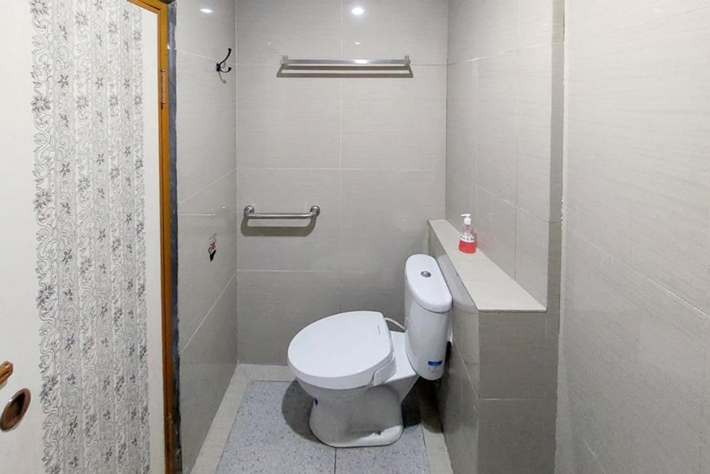 Twospaces Living At Maximus Inn Palembang Exteriör bild